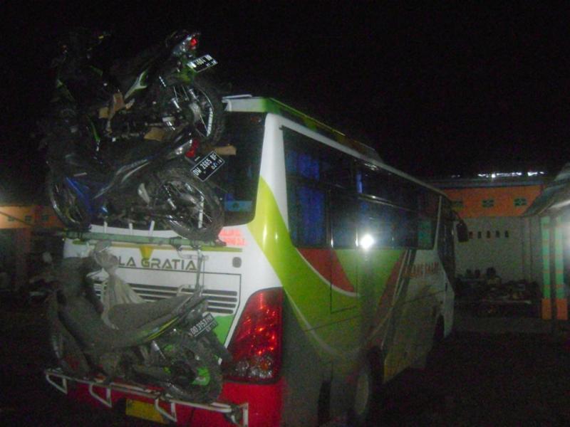 the condition and load of this bus tells you some of the difficult terrain