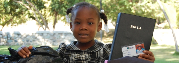 Haitian girl with gifts