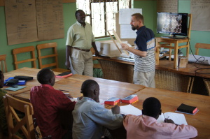 Mike Noel explains some of the finer points of beekeeping to students at the Church Planters Training Course in Arusha, Tanzania, last week.