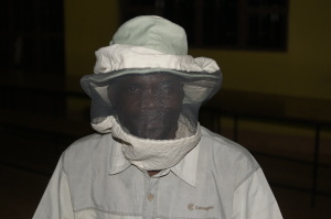 A new church planter/beekeeper models the veiled hat he made in Mike Noel's class last week.