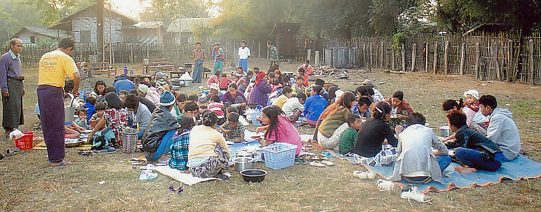 Villagers sharing a meal