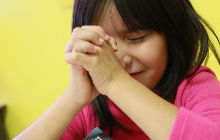 Navajo student praying