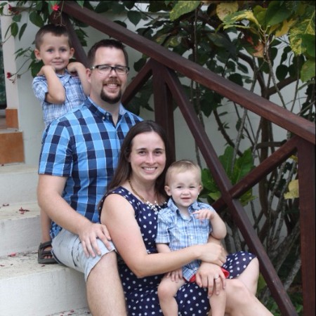 The Bennett Family sitting on stairs