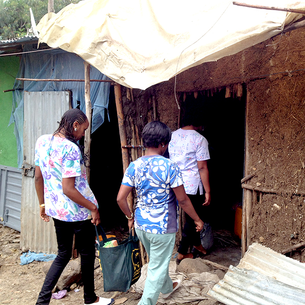 HOUSE CALL — The Strong Hearts hospice team enters the home of a patient in Kore, Ethiopia.